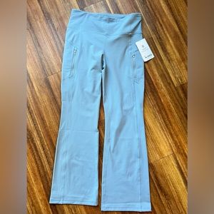Never worn! Athleta Rainier Bootcut Pant, baby blue size large.